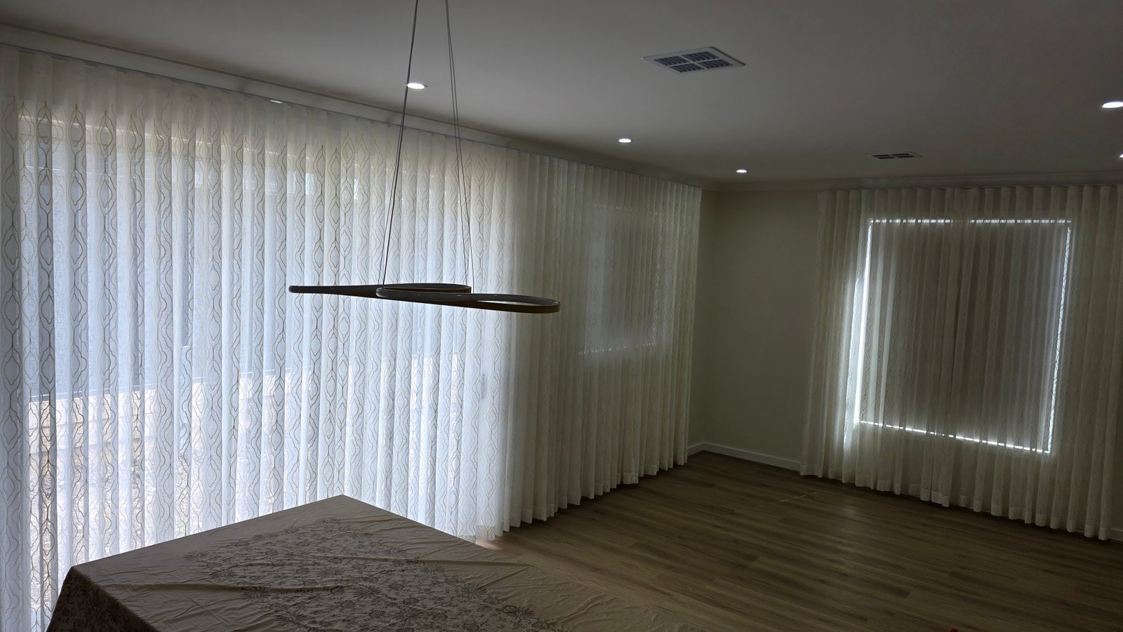 Stylish S-fold sheer curtains with elegant wave pattern